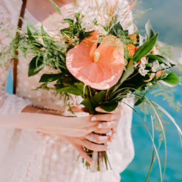 A light coral bouquet for a wedding in the style of Boho