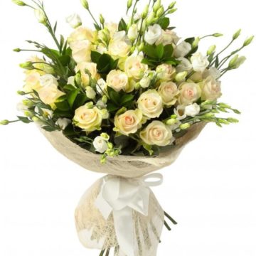 The bouquet consists of spray roses and lisianthus